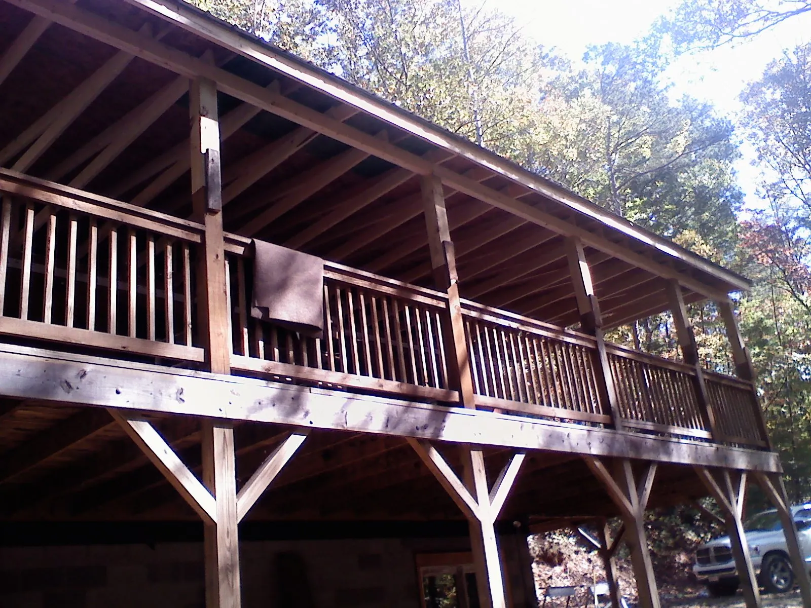 Timber framing under a new elevated porch and deck — Roof Leak Repair in South Jamesport by Roofing Brothers